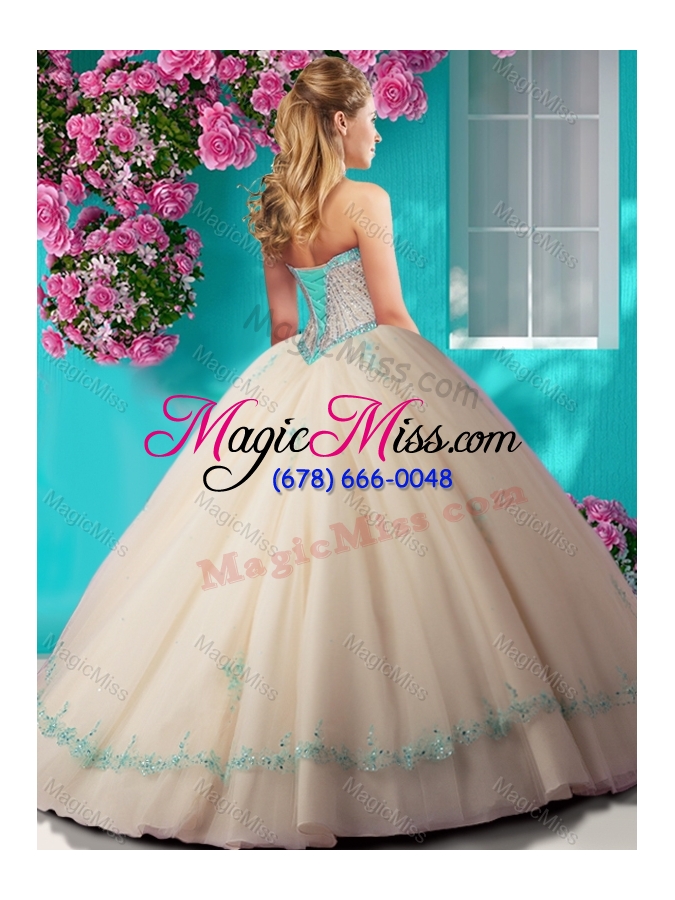 wholesale elegant beaded and applique tulle quinceanera dress in champagne