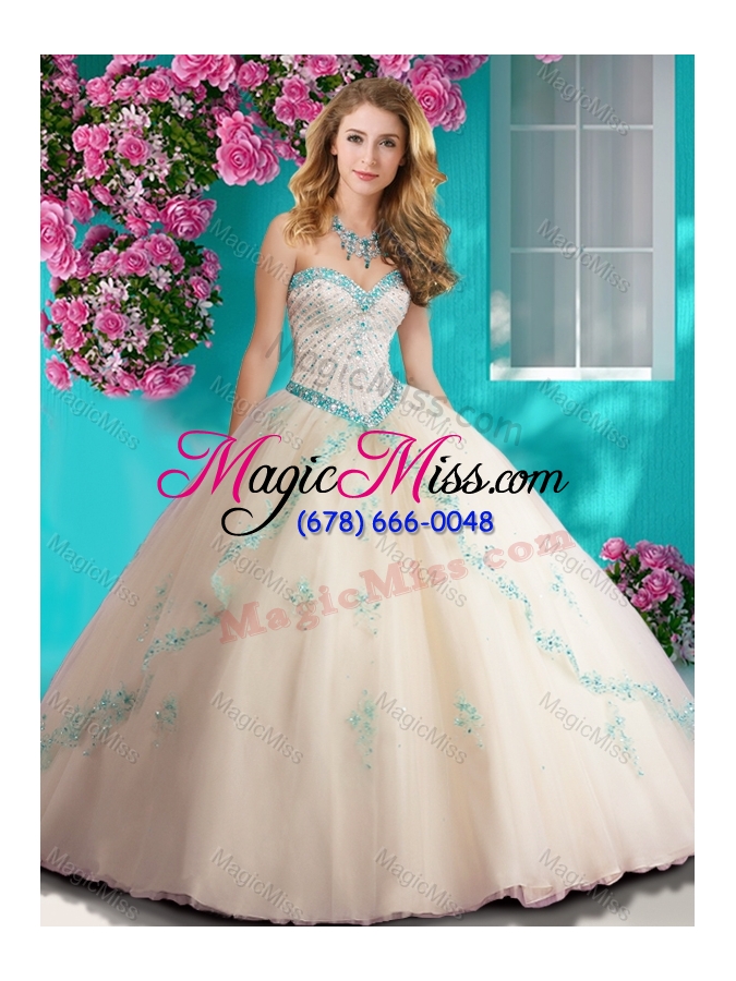 wholesale elegant beaded and applique tulle quinceanera dress in champagne