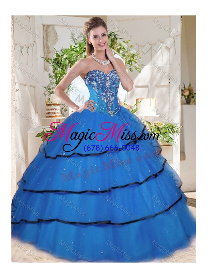 wholesale unique beaded and ruffled layers blue quinceanera gown in organza