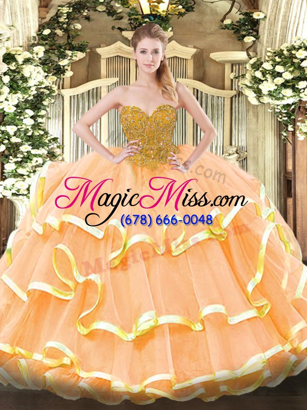 wholesale sweetheart sleeveless 15th birthday dress floor length beading and ruffled layers peach organza