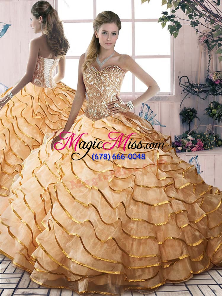 wholesale charming organza sweetheart sleeveless brush train lace up beading and ruffles quinceanera dresses in gold