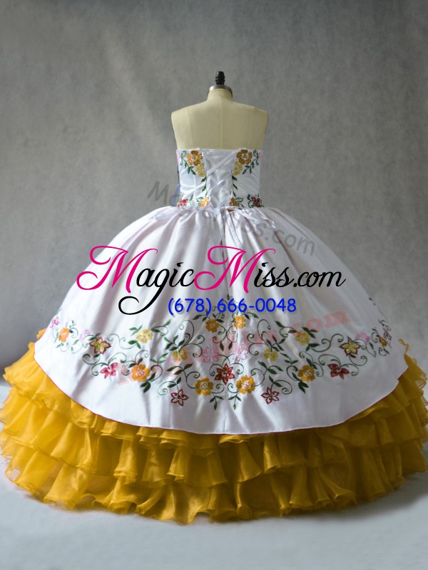 wholesale cheap sleeveless organza floor length lace up 15 quinceanera dress in gold with embroidery and ruffled layers